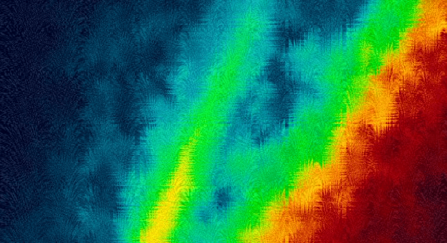 Abstract background with a jagged, multi-colored gradient and crystalline texture.